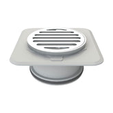 100mm Round Megaflex Stick Down Floor Waste: chrome brass grate, ABS flange bonds securely to waterproofing membrane.