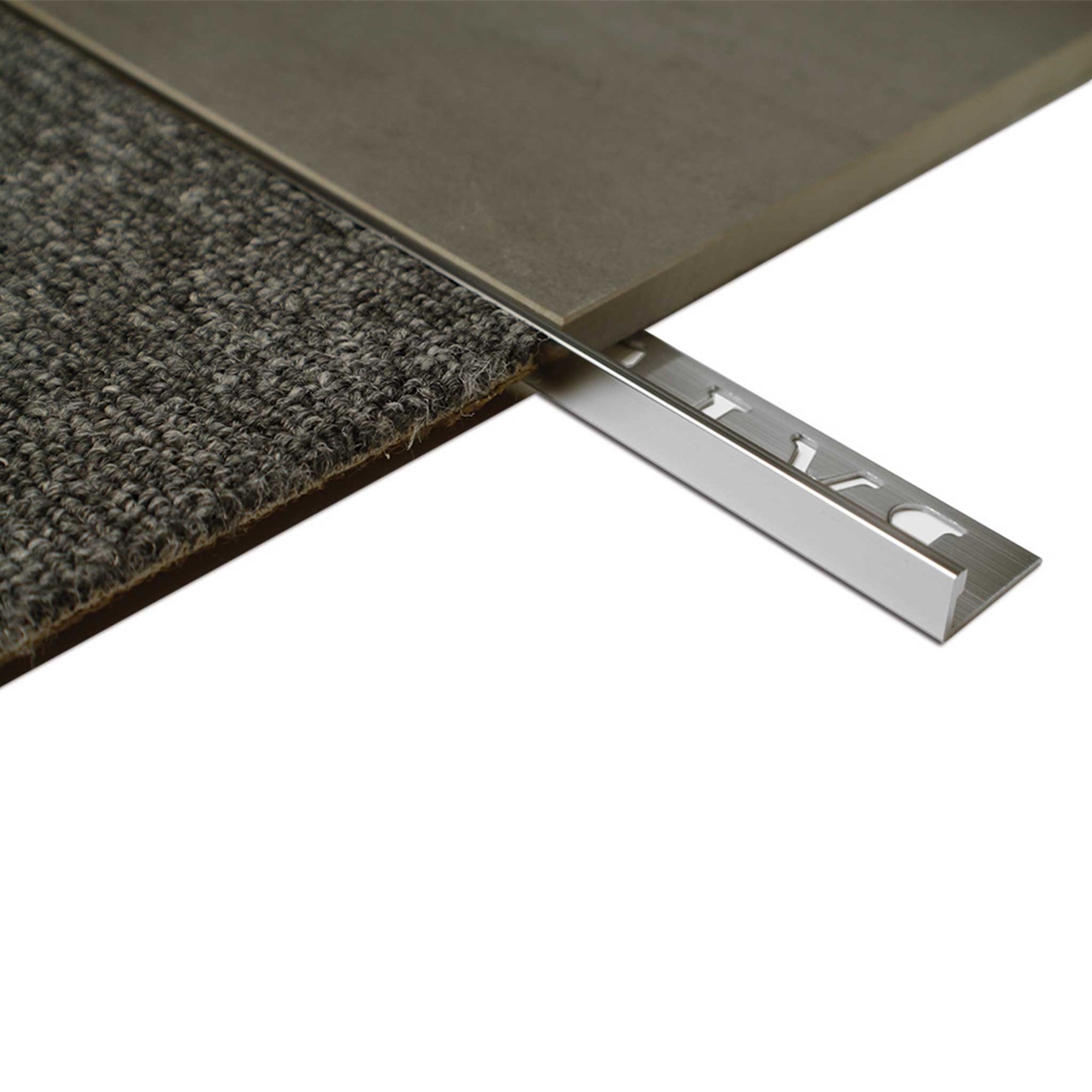 L-shaped perforated aluminium tile angle protects edges in showers/bathrooms, bonds via grout/adhesive for wet areas.