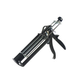 Hand-operated twin cartridge caulking gun (2x200ml) with steel rod for precise dispensing of two-part adhesives and sealants.