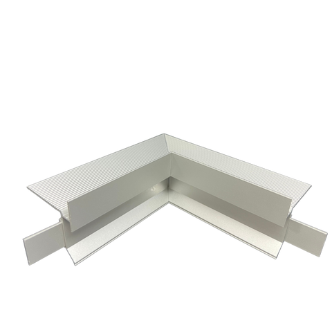 White ribbed PVC L-shaped corner flashing for roofing, 90-degree angle with fluted edges for secure fit.